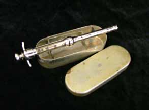 syringe by Pettie & Whitelaw